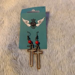 Cross earrings with a red bead